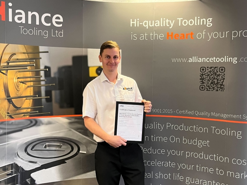 Chris Rossell holding ISO 14001 Accreditation